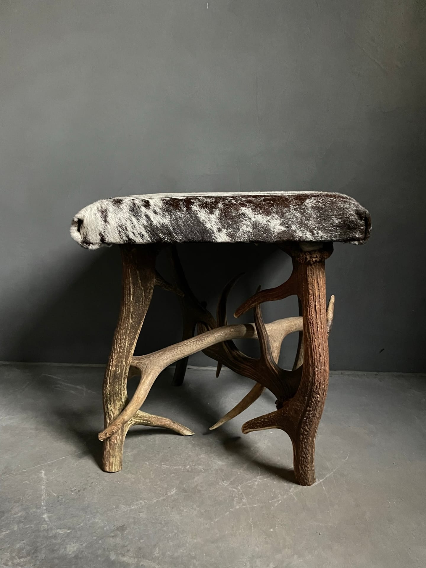 Antler stool covered with cowhide