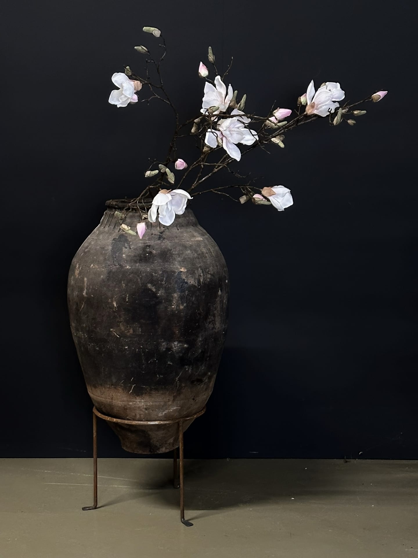 Antique olive jar on stand