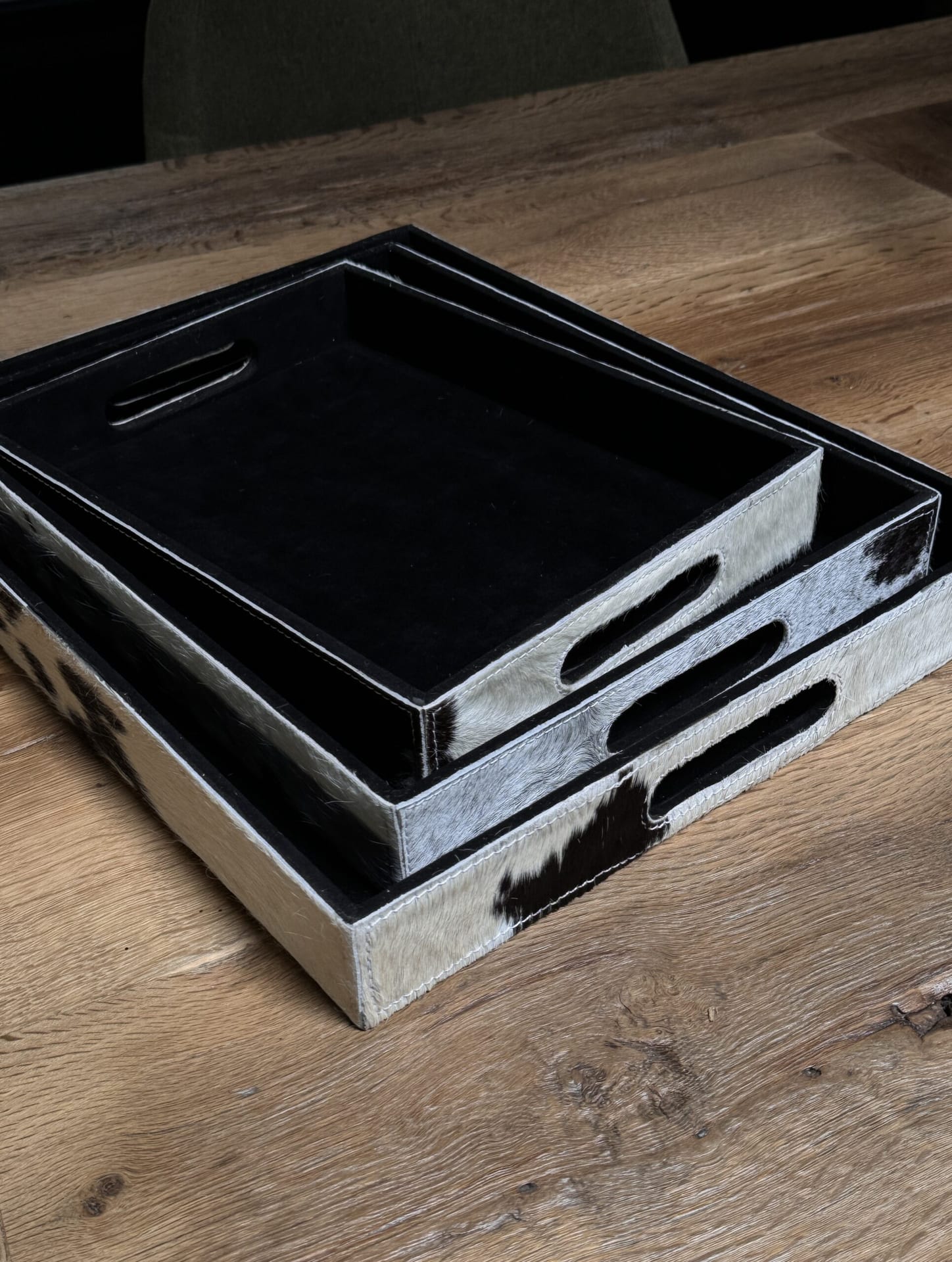 Set dienbladen van koehuid